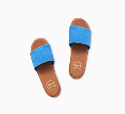 Tommy Bahama: André Assous Paloma Suede Featherweights™ Sandals, Blue | Photo: Tommy Bahama